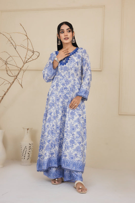 Floral printed blue and white cotton suit with an intricately embroidered neckline complimented by wide leg pants