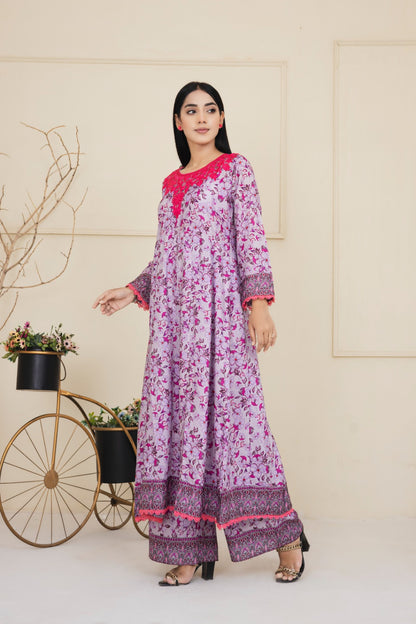 Floral printed purple cotton suit with an intricately embroidered neckline complimented by wide leg pants