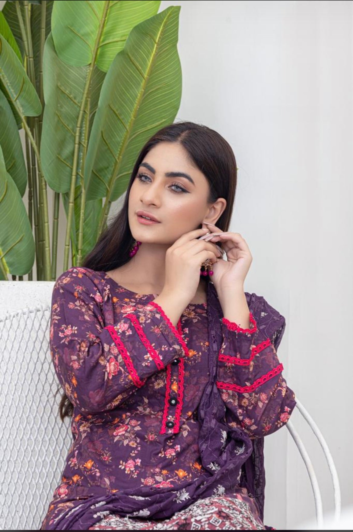 Purple Lawn Rangz Pret floral suit adorned with pink lace and mirror work including printed tulip trousers with pink lace and an embroidered chiffon dupatta.